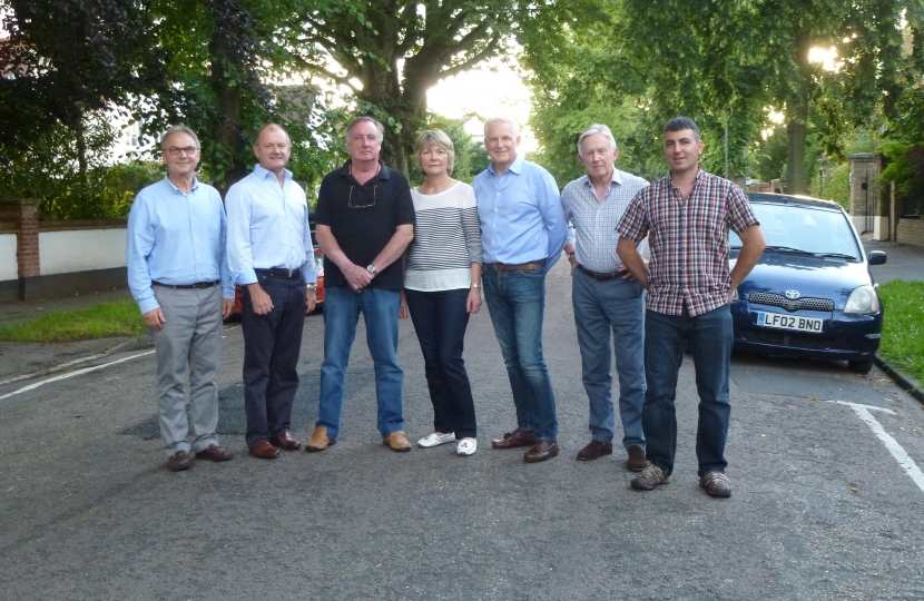 Peter Szanto (left) and Steve Bax (right) with residents in Wolsey Road